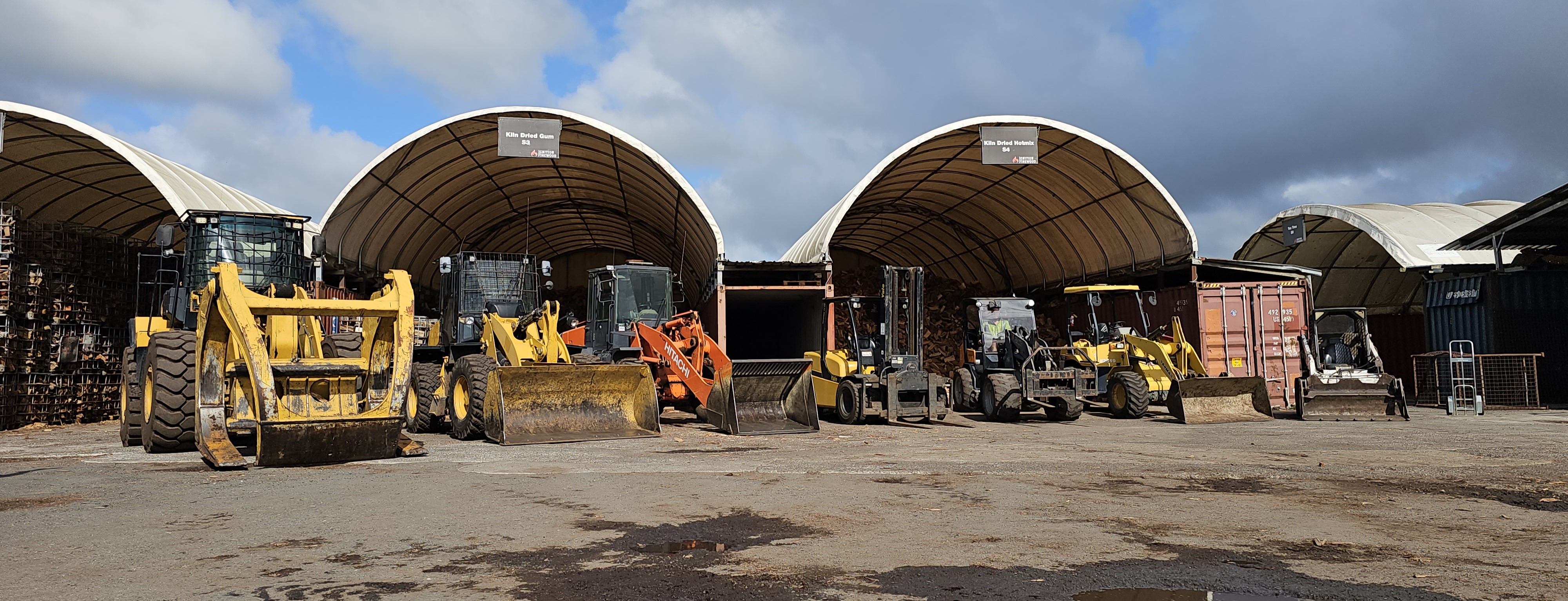 Ignition firewood storage sheds and loaders